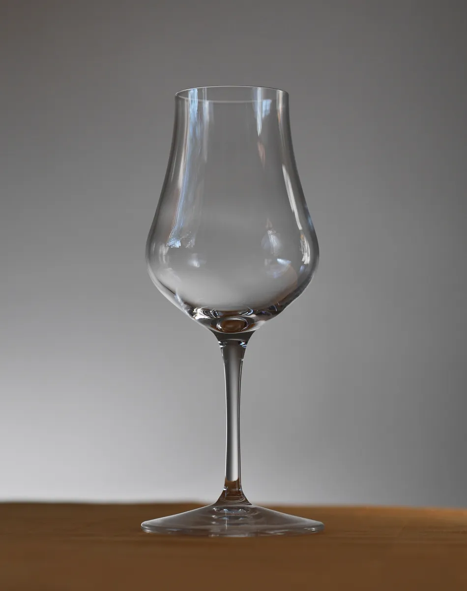 Glass of whisky - dark spirits contain more congeners